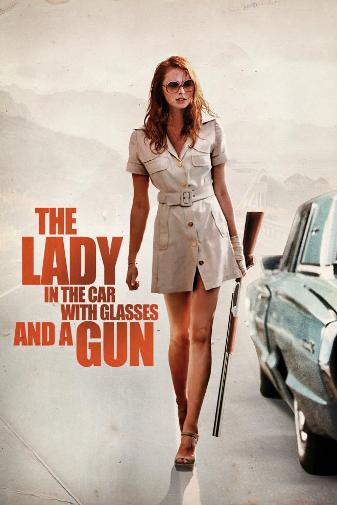 The poster art for the film, featuring the character Dany standing beside a car, carrying a shotgun and wearing glasses.